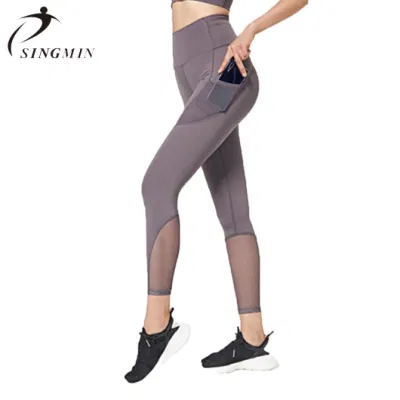 Pantaloni da yoga nudi Pantaloni sportivi tascabili traspiranti in rete elastica